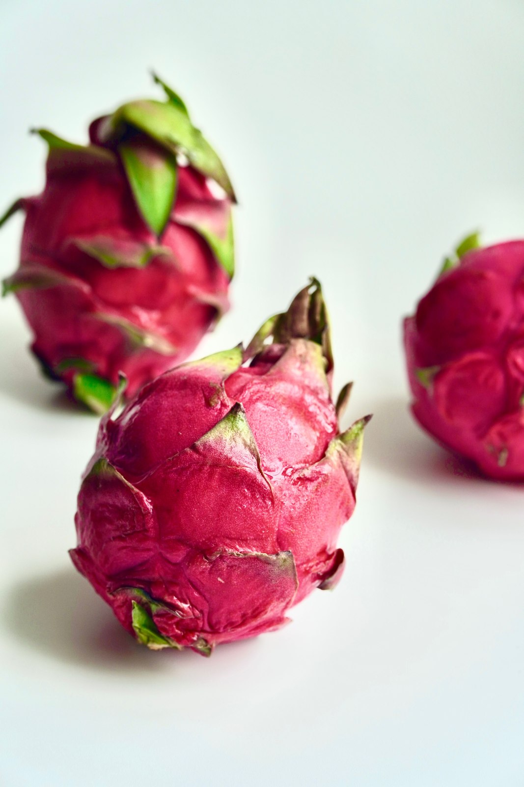 Illustrative dragon fruit photograph; flesh colour and cultivar are not verified.