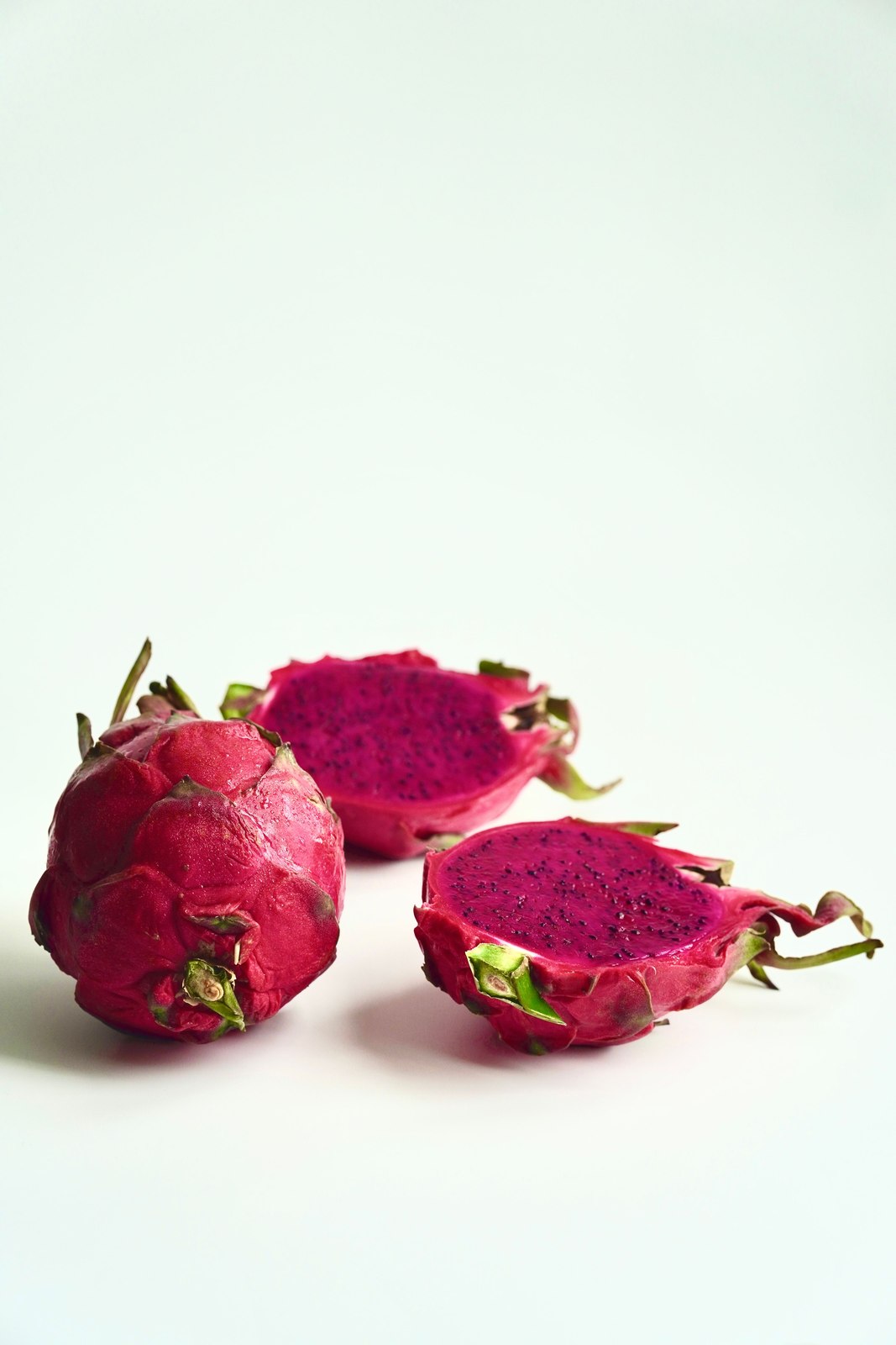 Illustrative dragon fruit photograph; flesh colour and cultivar are not verified.