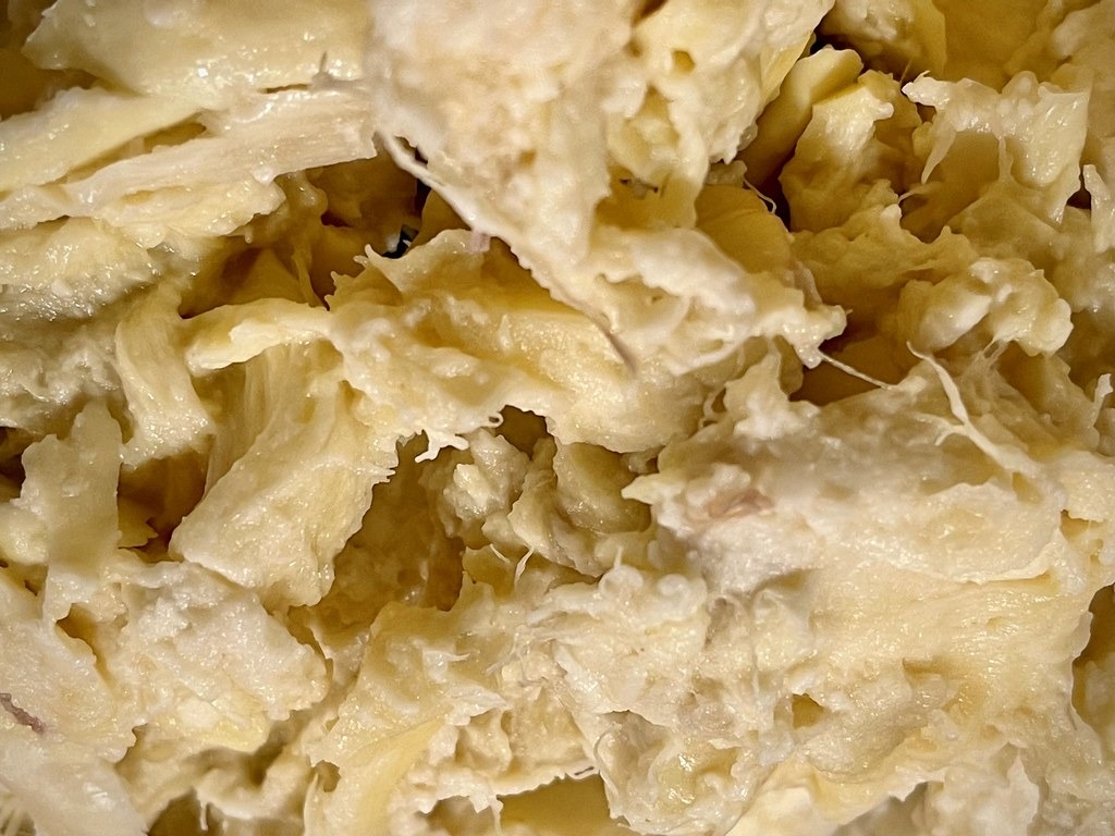 A close-up of the soft texture of durian flesh.